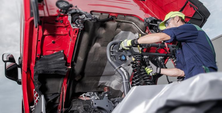 Man repairing truck